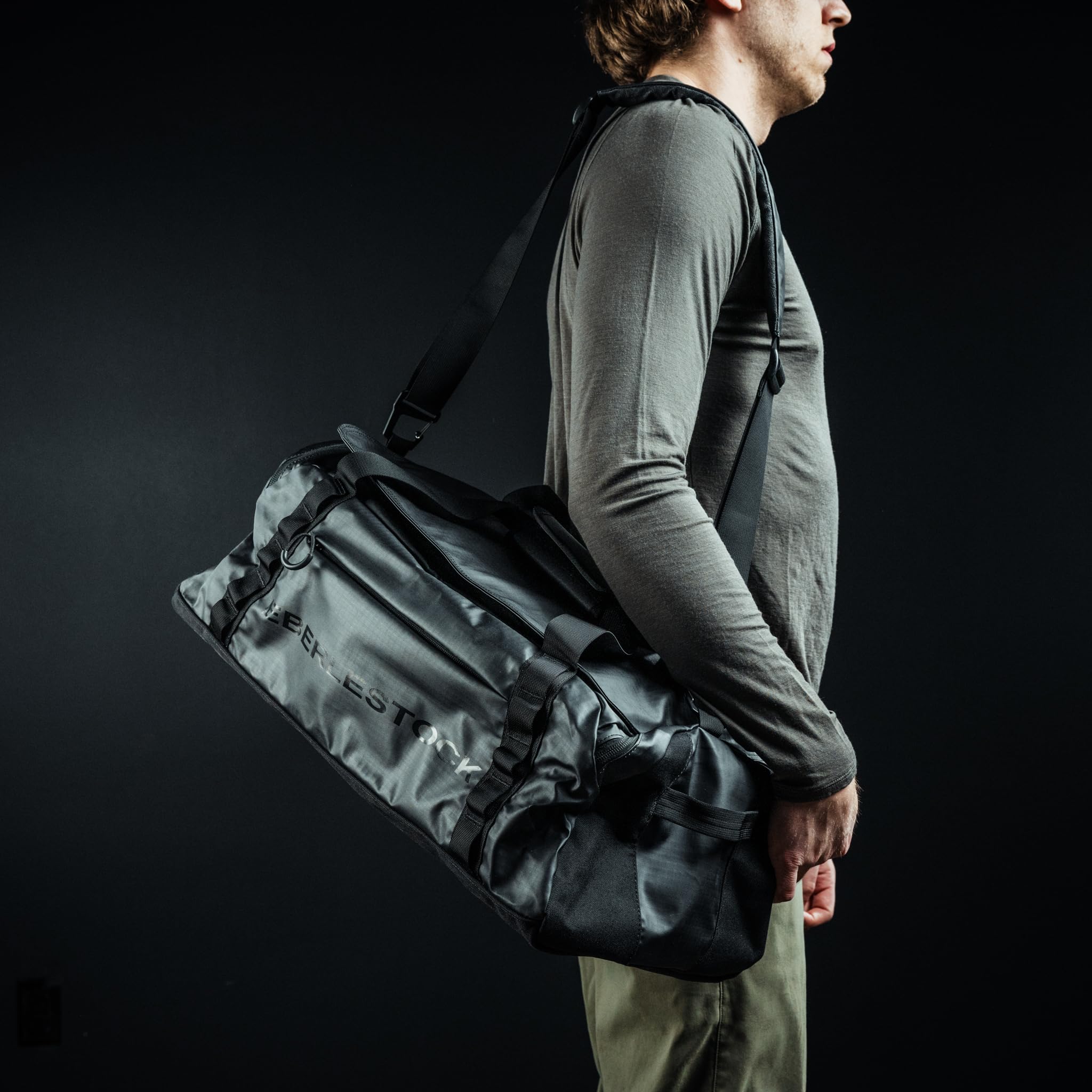 Eberlestock Hyllus duffel bag side view shows rugged sides for rugged travel and quick access.