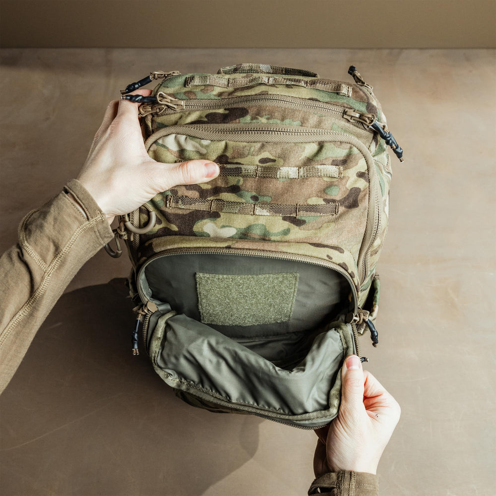 Eberlestock Romad Pack hydration pocket access enables uninterrupted hydration while moving.
