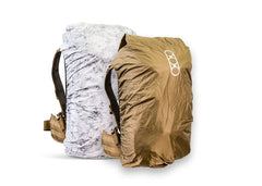 Eberlestock Small Reversible Rain Cover protects a compact backpack from rain in Coyote Brown.