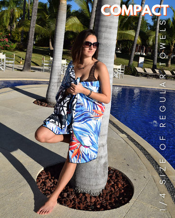 ECCOSOPHY Tahiti quick-dry towel demonstrating fast absorbency after a swim