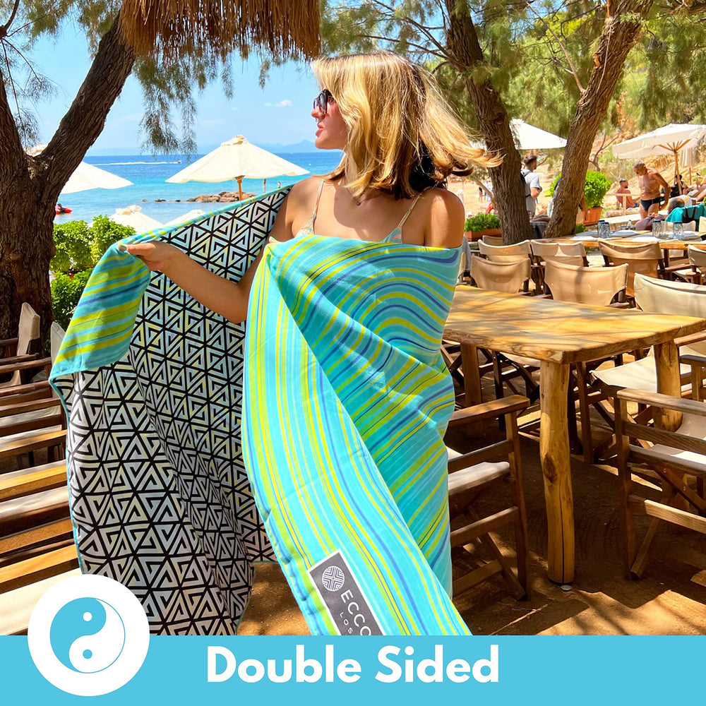 ECCOSOPHY oversized towel laid out for lounging