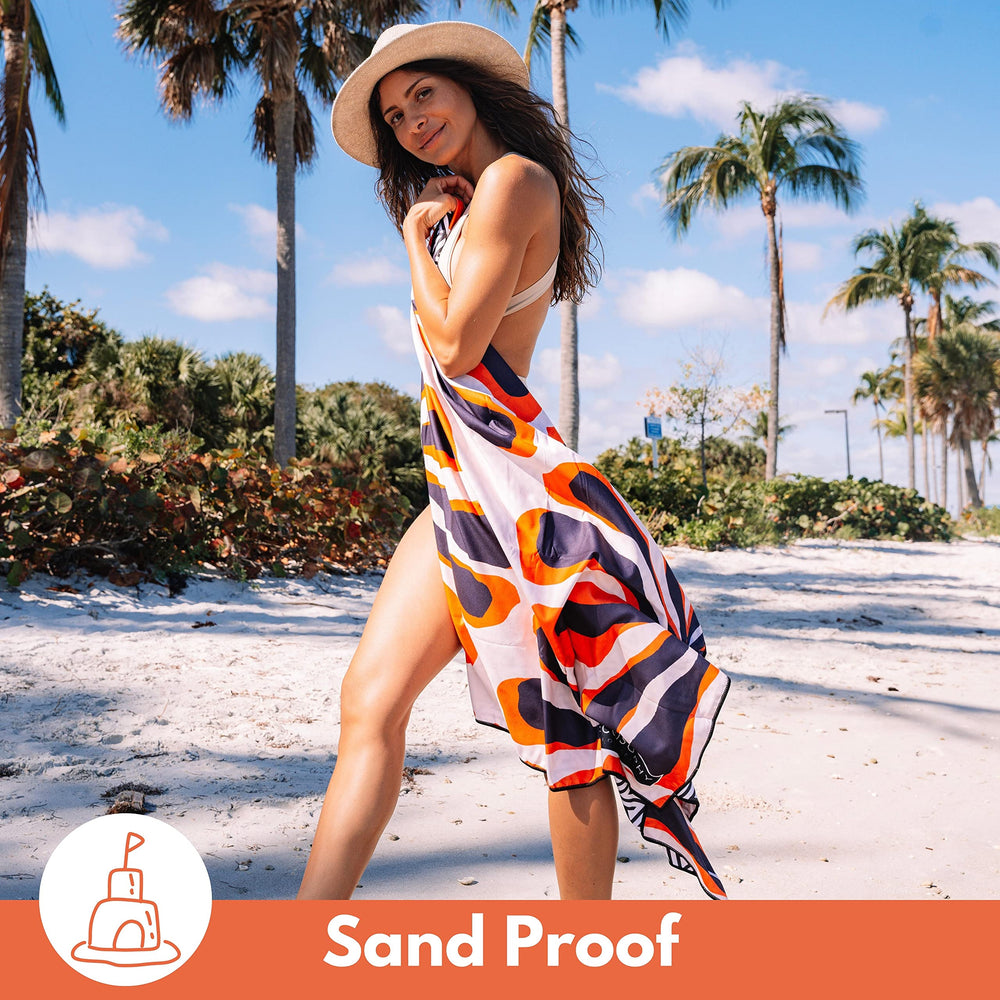 ECCOSOPHY two-sided-prints towel showcases vibrant beach and travel styling