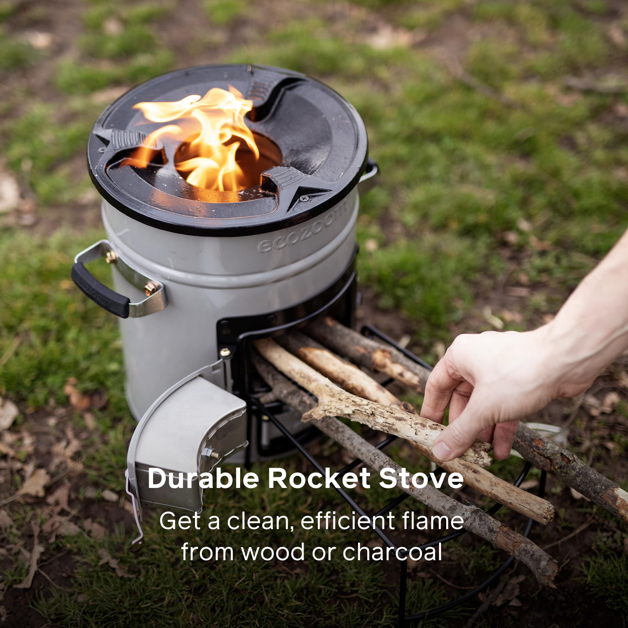 EcoZoom Rocket Stove charcoal-fuel-burn demonstrates versatile fuel options for off-grid meals.