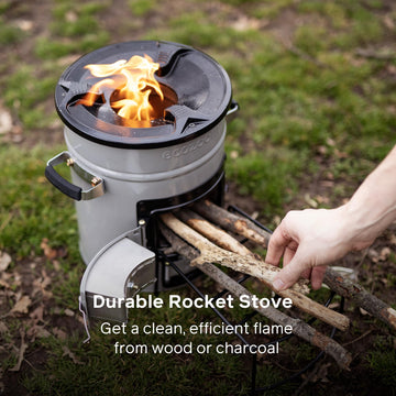 EcoZoom Rocket Stove charcoal-fuel-burn demonstrates versatile fuel options for off-grid meals.