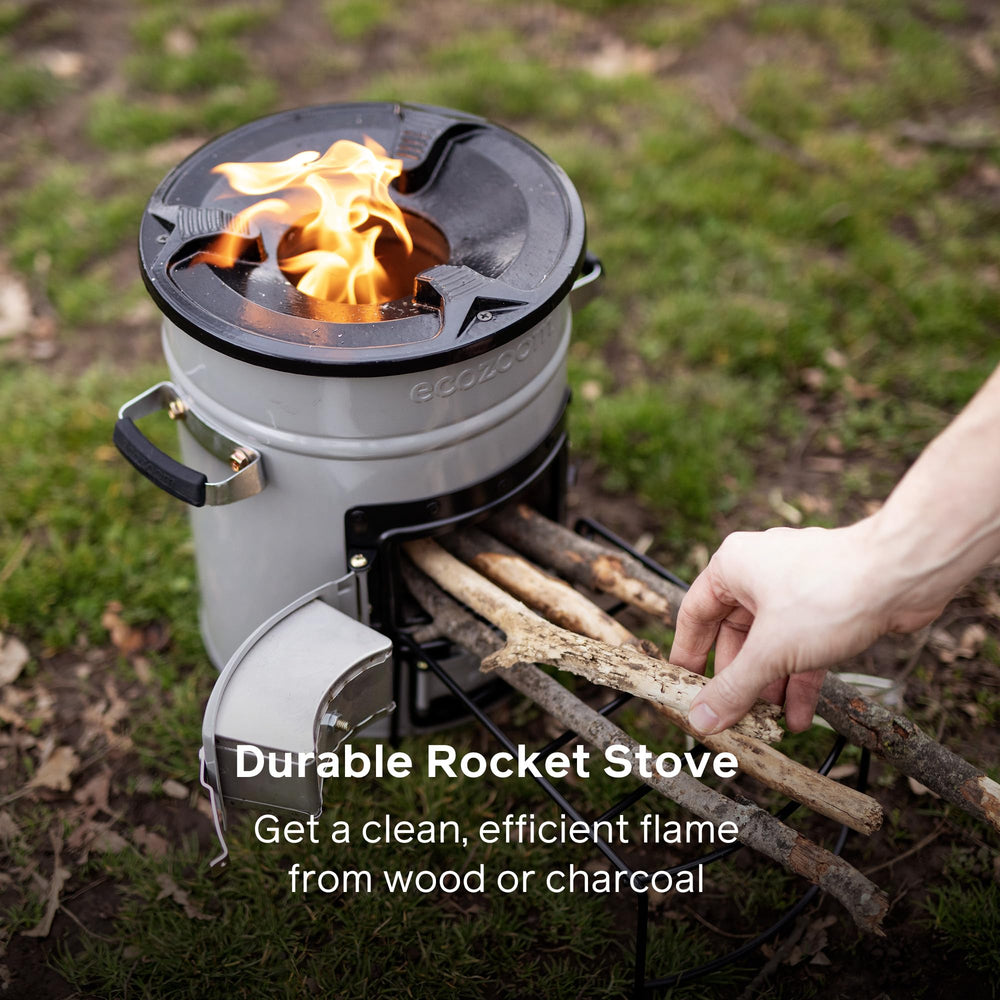 EcoZoom Rocket Stove charcoal-fuel-burn demonstrates versatile fuel options for off-grid meals.