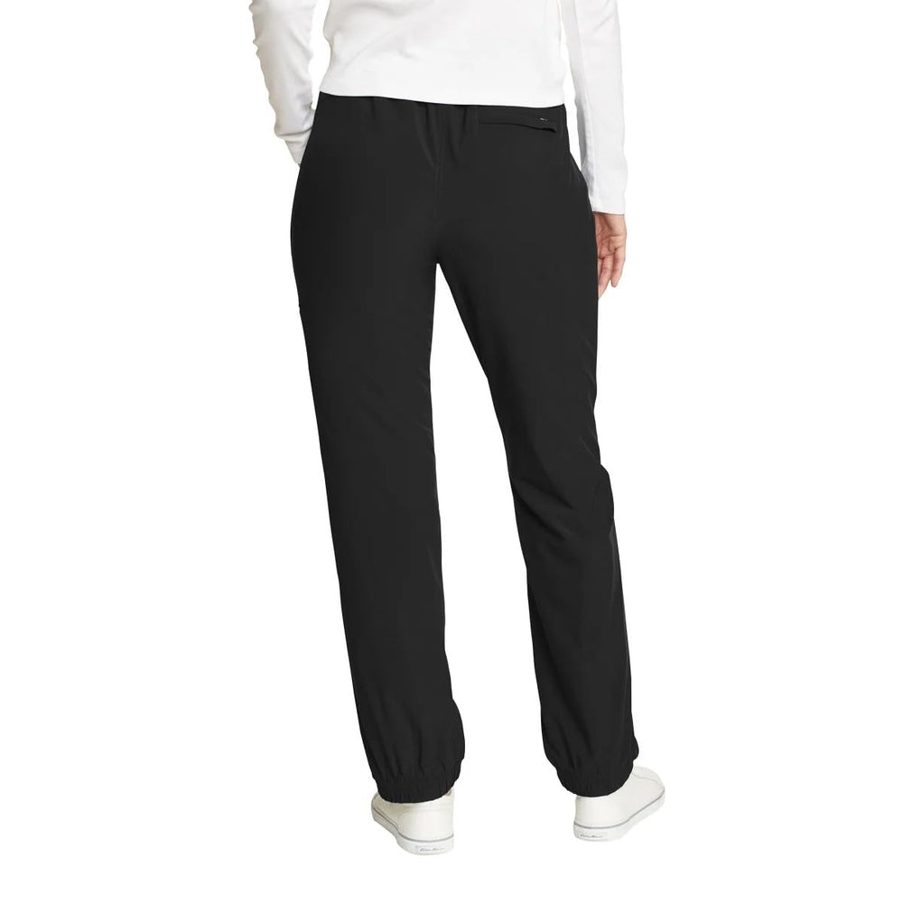 Eddie Bauer women's fleece-lined pants back pocket close-up highlighting utility in black.