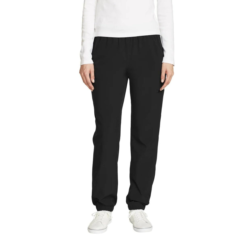 Eddie Bauer women's fleece-lined pants closeup shows StormRepel water repellency for wet commutes