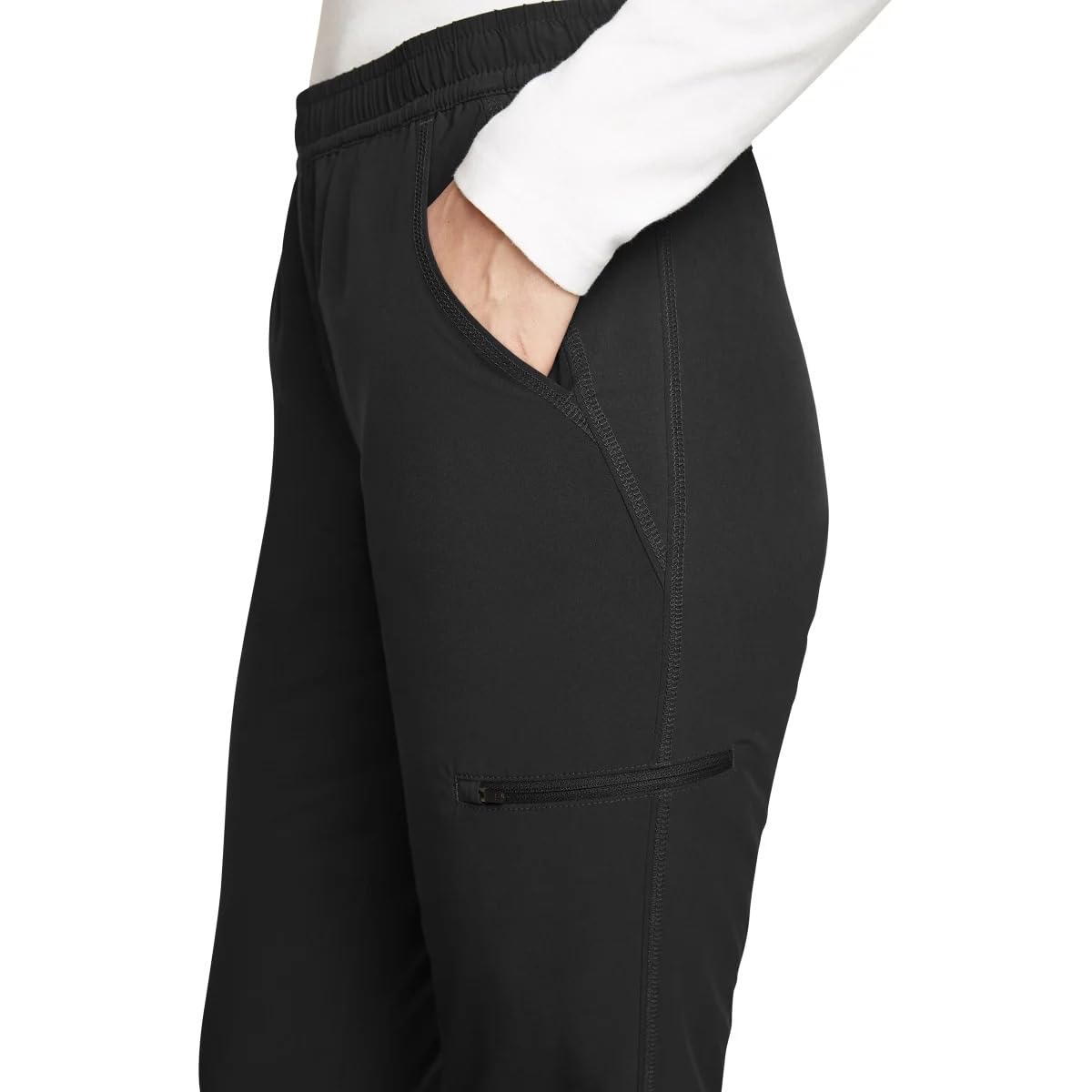 Eddie Bauer fleece-lined pants elastic cuffs demonstrate streamlined fit and mobility