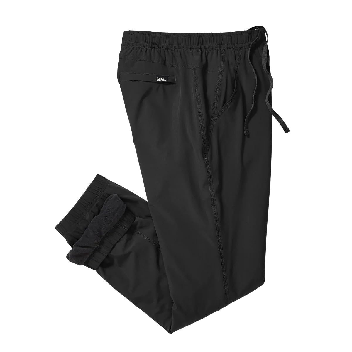 Eddie Bauer fleece-lined pants StormRepel rain-test image suggests rain resistance