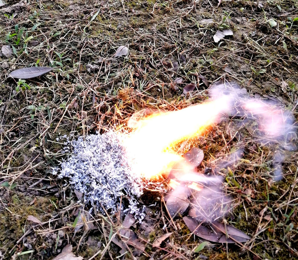 eGreen ferro rod closeup displaying long-lasting sparks