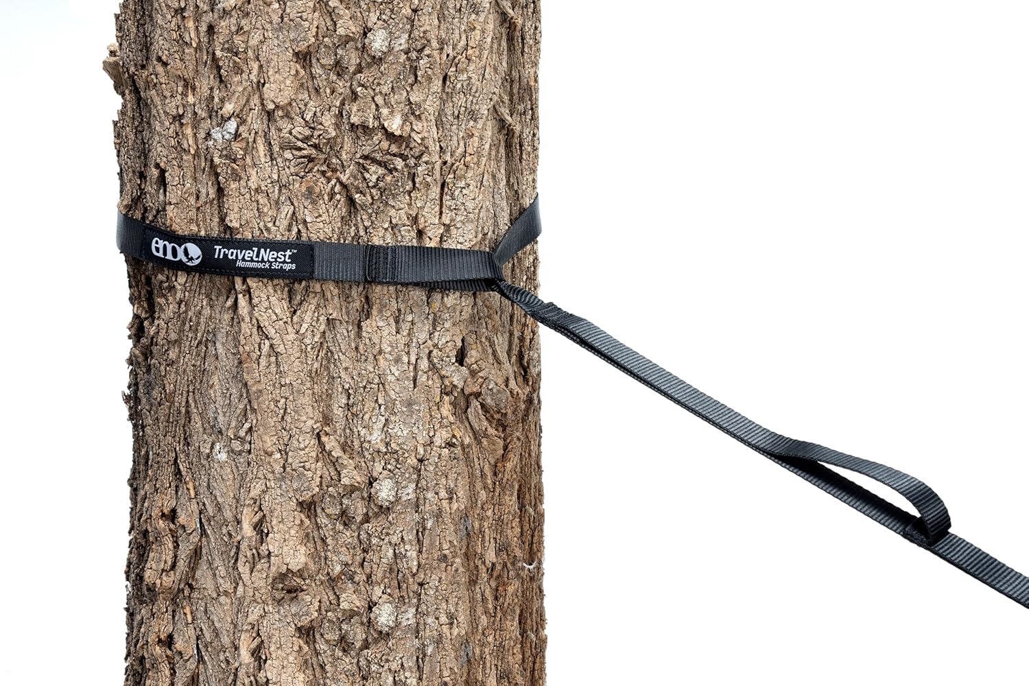 ENO TravelNest strap-in-use shows quick setup in varied terrain, appealing for time-saving outdoor rests.