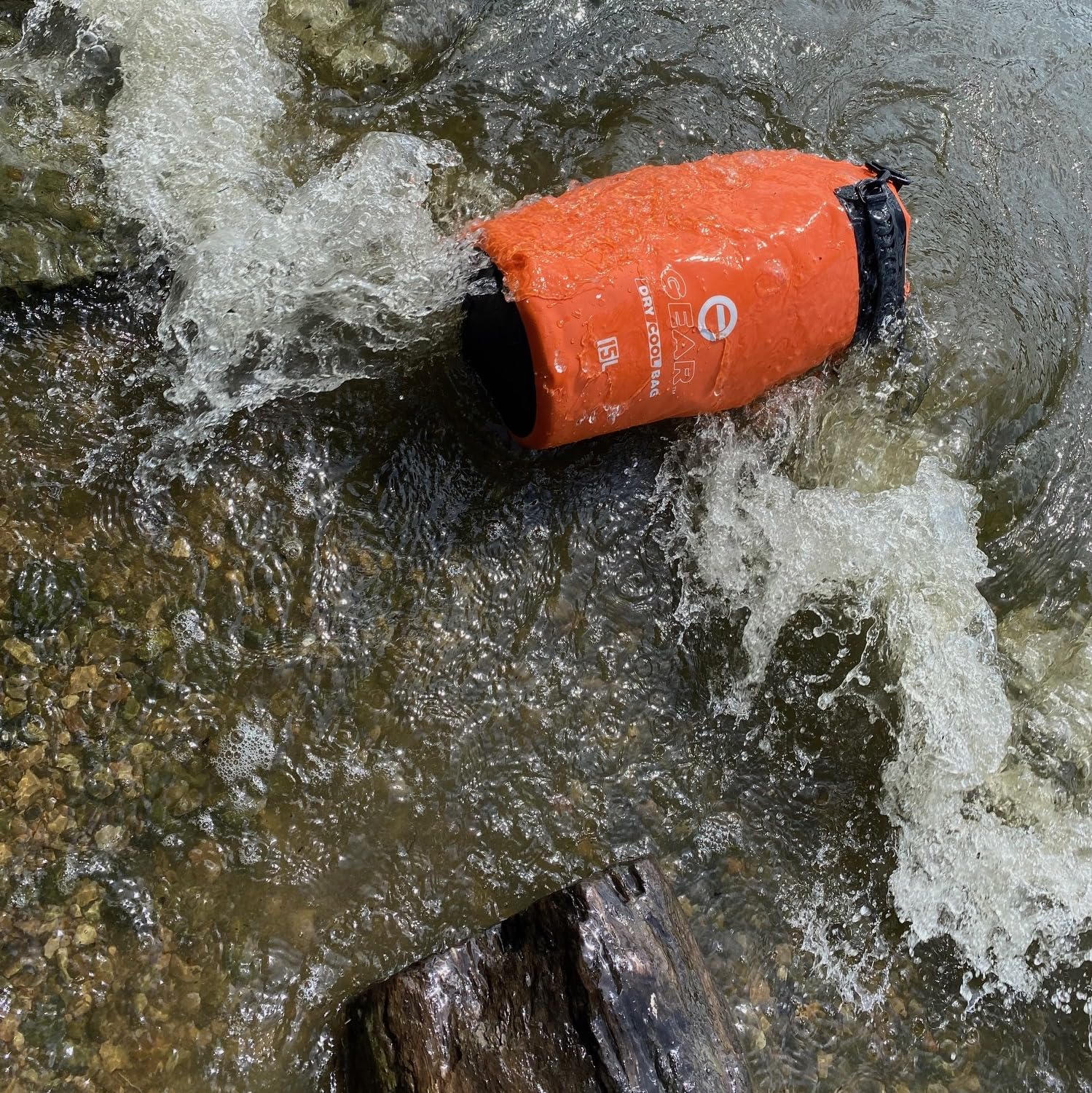 Enthusiast Gear insulated dry bag cooler leak-proof design during beach picnics.