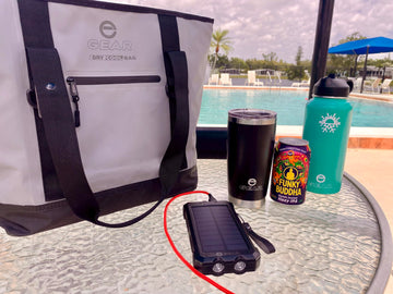 Enthusiast Gear zippered top insulated tote pictured at the beach for easy access