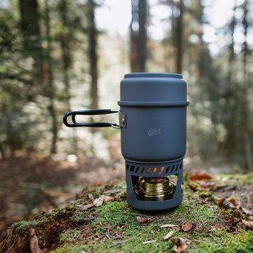 Esbit solid fuel base and included stove accessories.