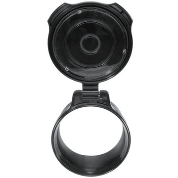 Close-up of black sun-shield disk on scope cap