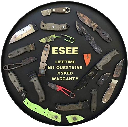 ESEE Arrowhead Wallet opened to reveal storage area and arrowheads