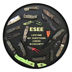 ESEE fire steel survival fire starter center divot enables bow drill compatibility in primitive fire methods