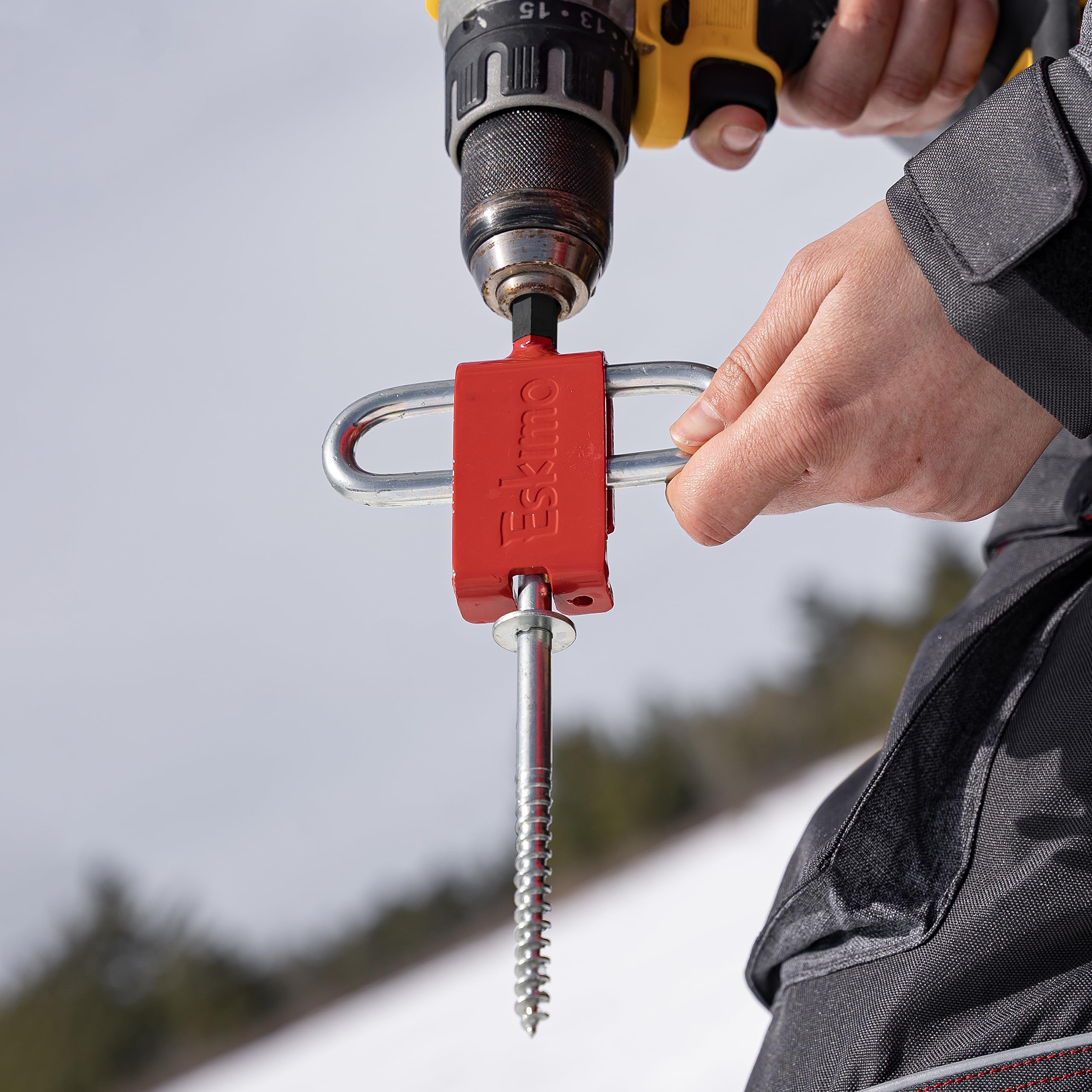 Eskimo Anchor Install Adapter in use with a drill for fast anchor placement.