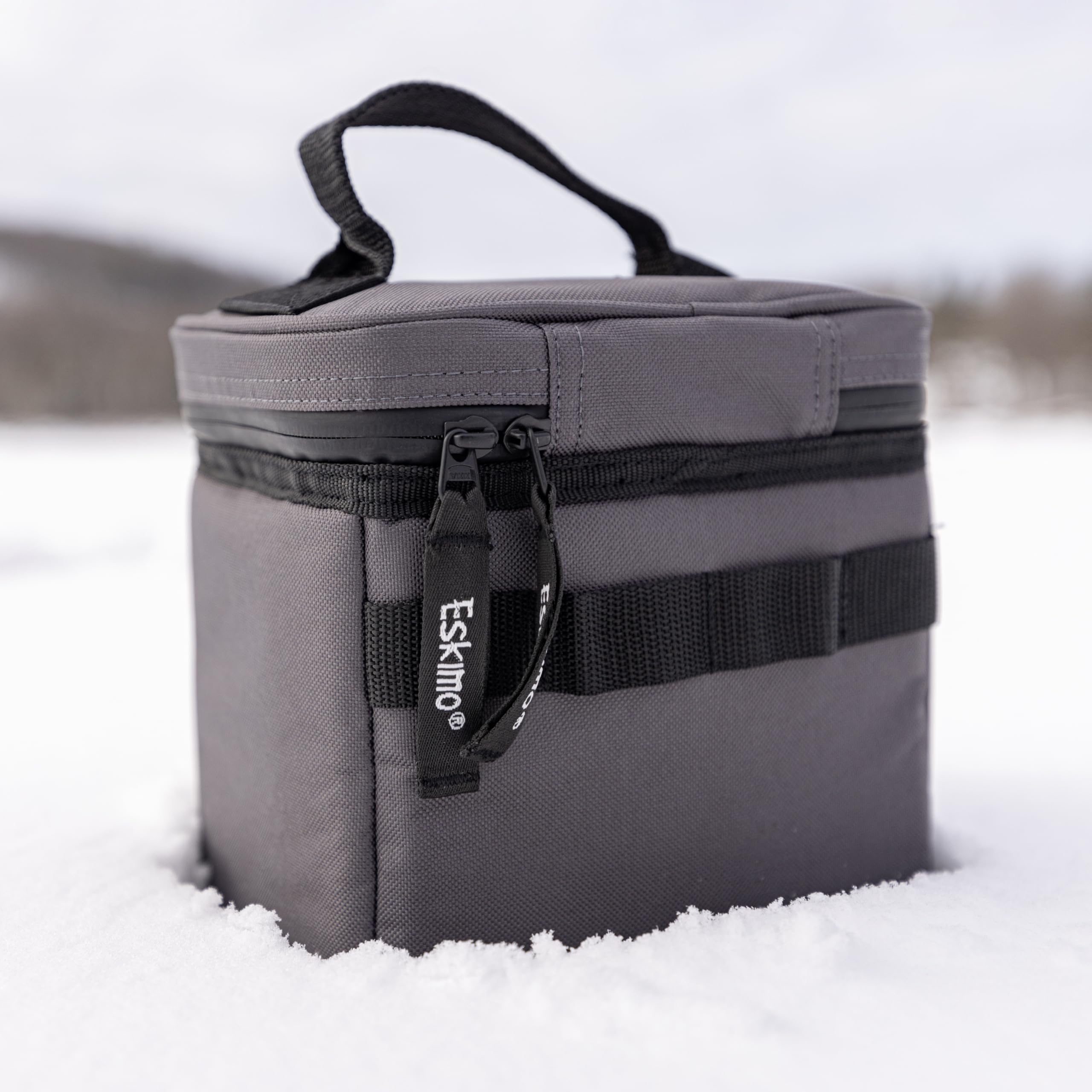 Durable carry handle supports on-the-go storage for winter tasks.