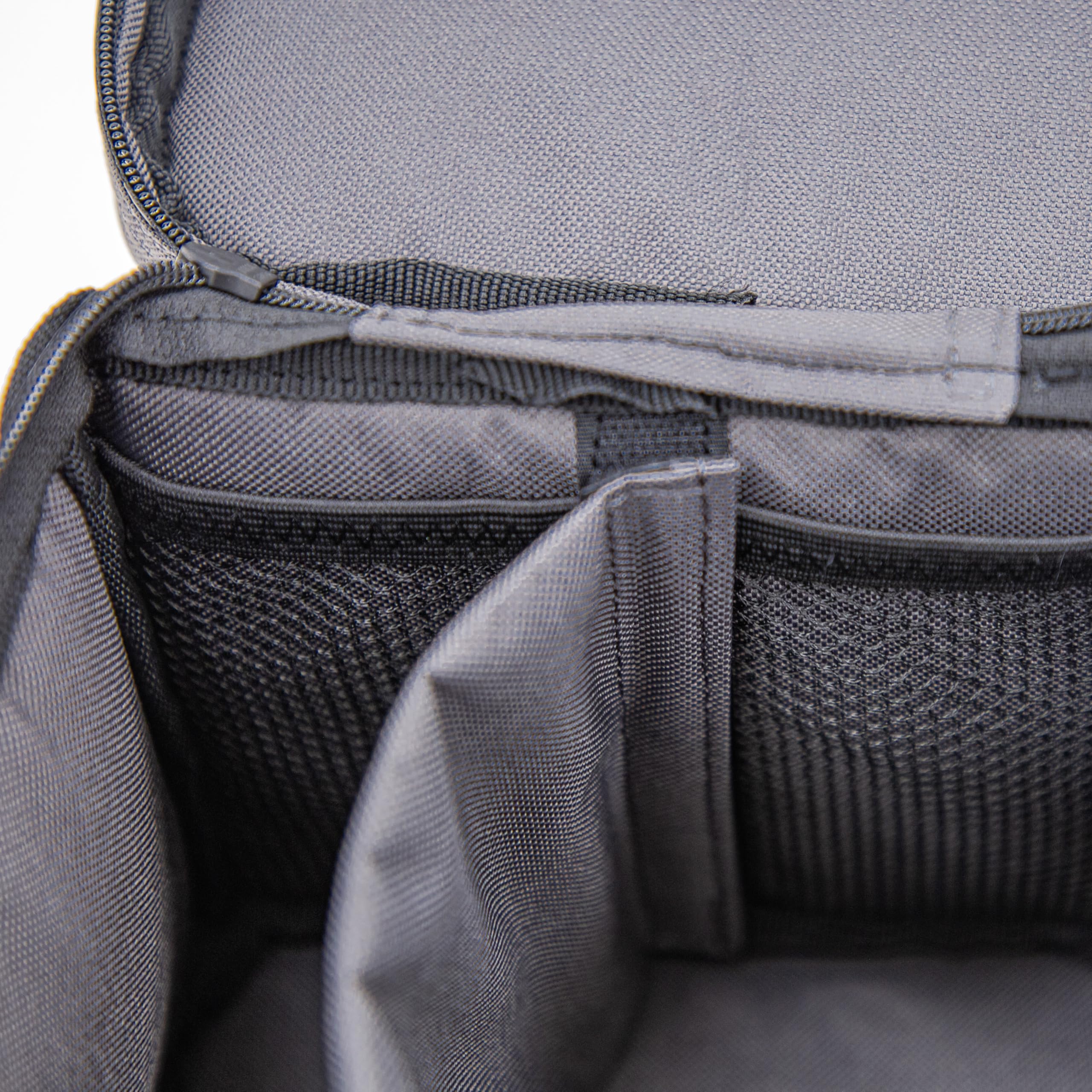 Handles and interior pockets keep hand warmers and small items ready for quick access.