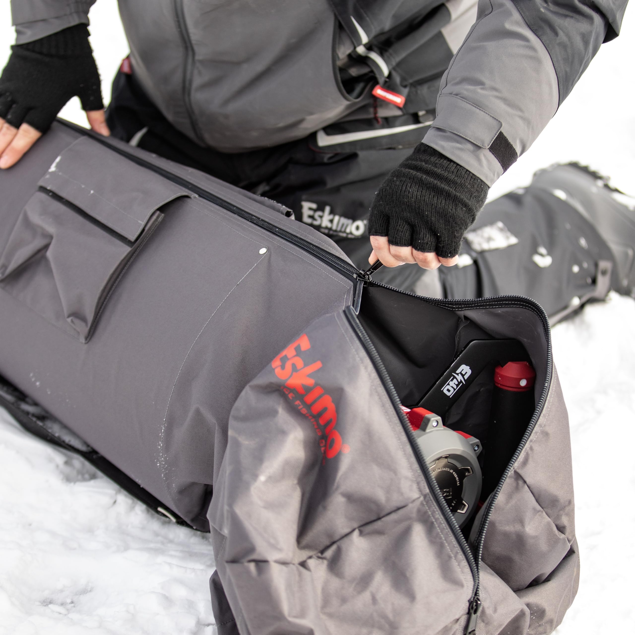 Eskimo Electric Auger Carry Bag exterior pocket for auger extension and small parts.