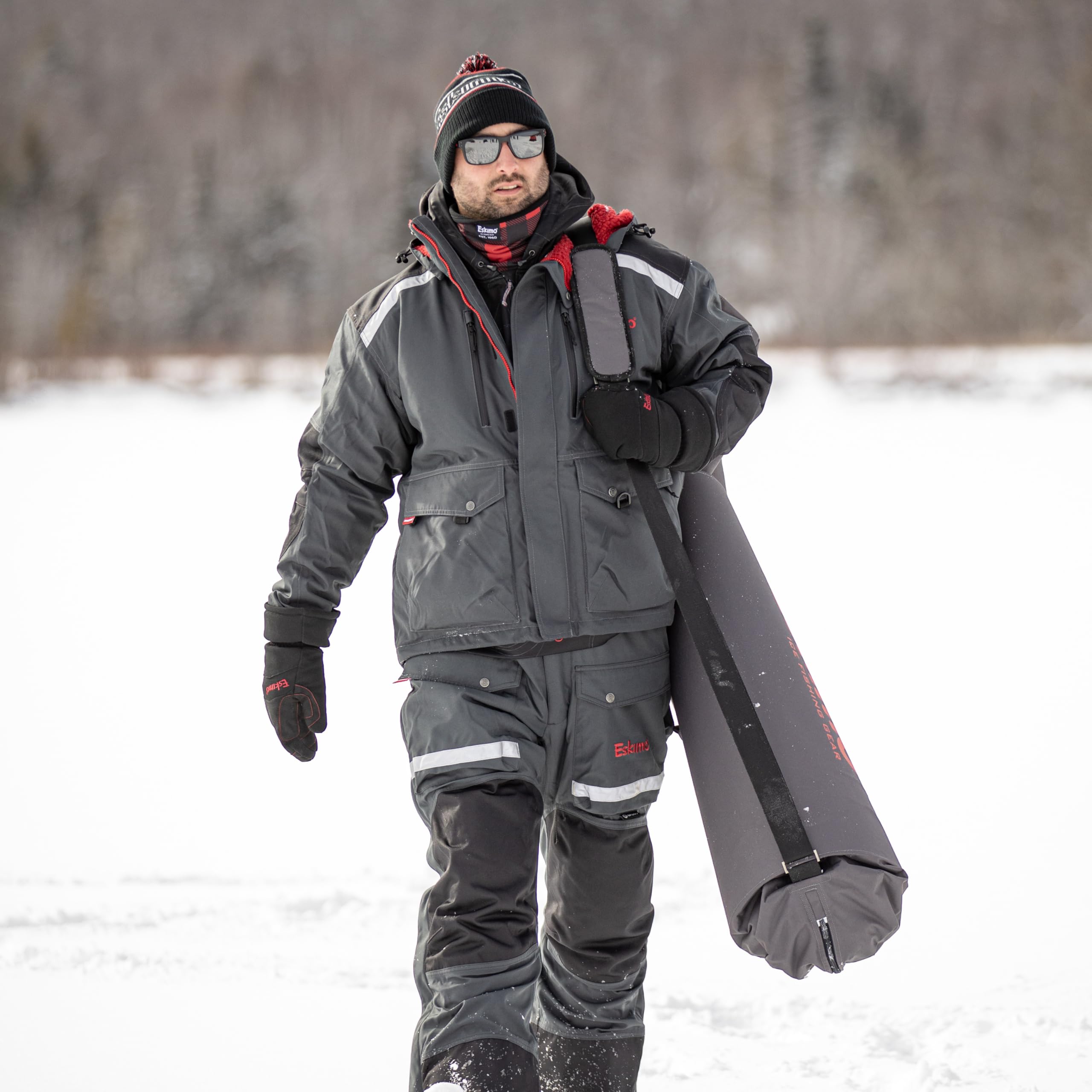 Eskimo Electric Auger Carry Bag exterior pockets organize tools and quick connect kit.