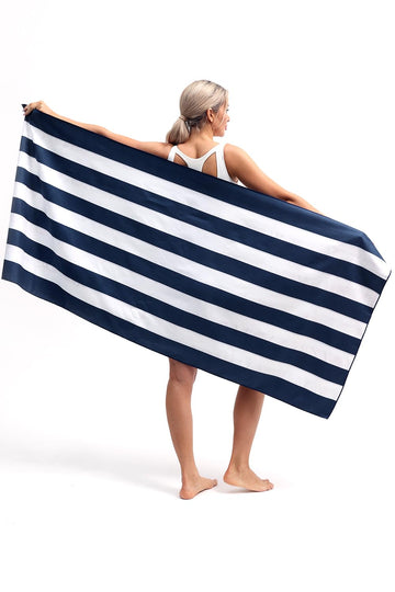 Eunzel 71x32-inch towel spread out for lounging and sun.