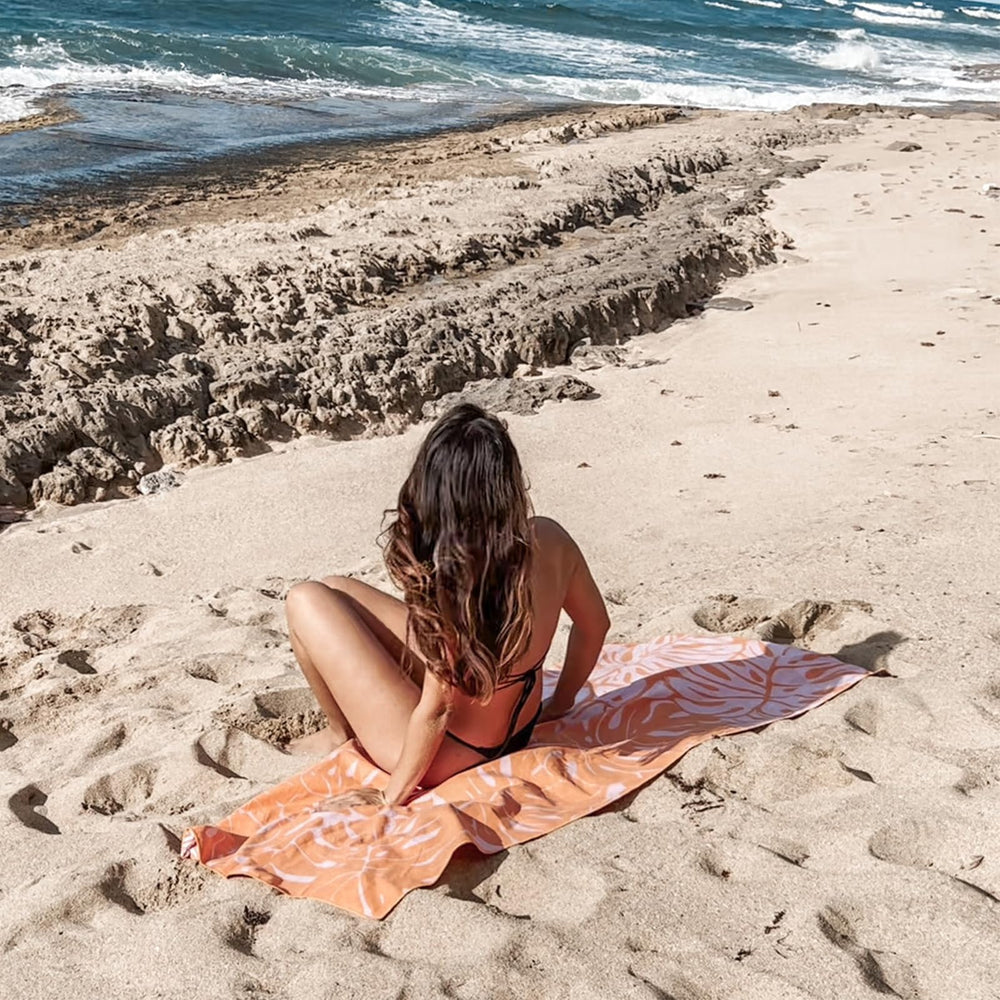 Eunzel double-sided towel design offers vibrant colors for pool or beach days.