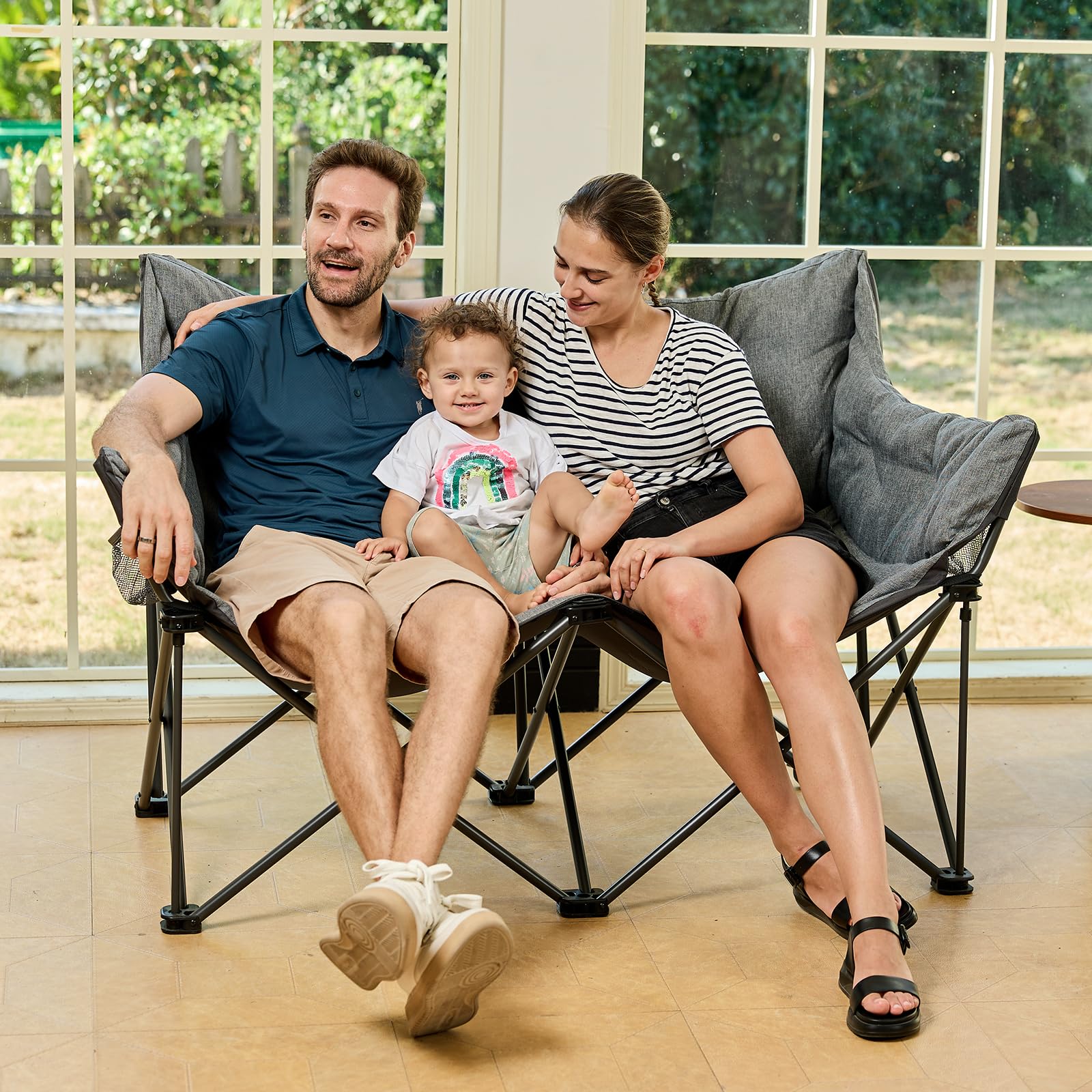 Ever Advanced two-person folding chair backrest supports relaxed outdoor lounging.