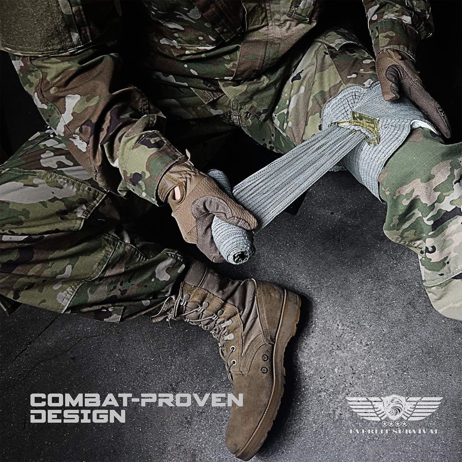 Everlit triangle and elastic bandage set for immobilization in the field.