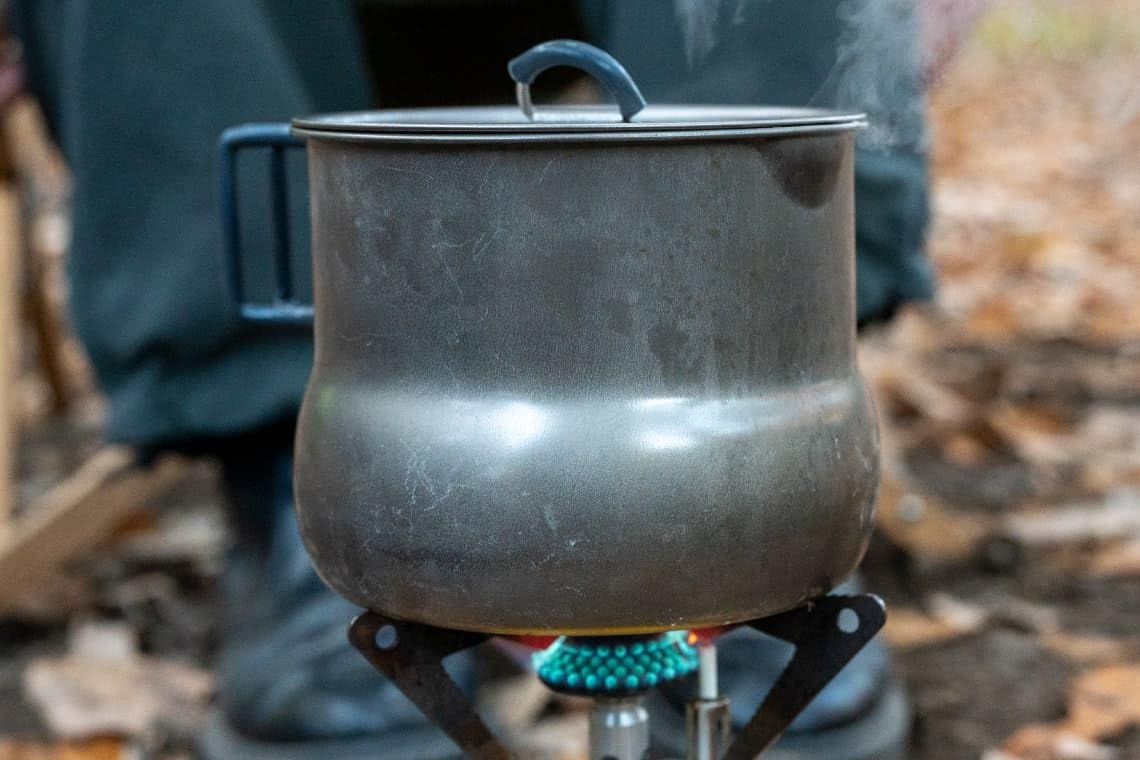 Evernew titanium camping tea pot featuring engineered pour spout for drip-free pouring