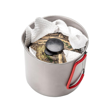 Evernew portable pot measures 12.5 by 11.5 cm for compact camp use