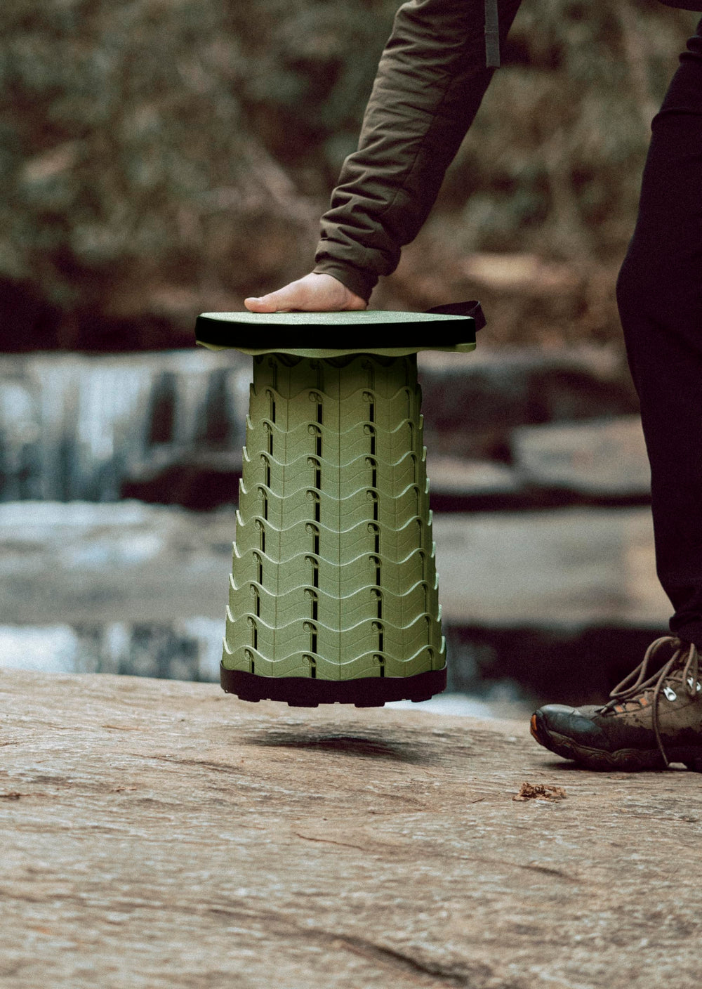 Nomad Seat fits inside most backpacks for travel-ready seating anywhere.