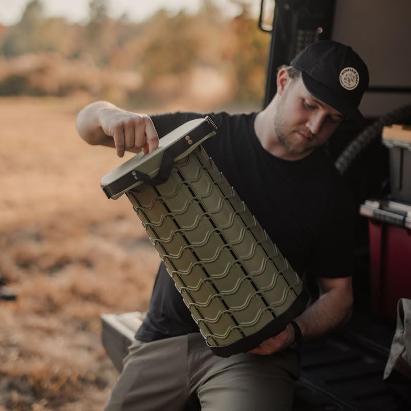 Nomad Seat built-in shoulder strap enhances portability during hikes and trips.