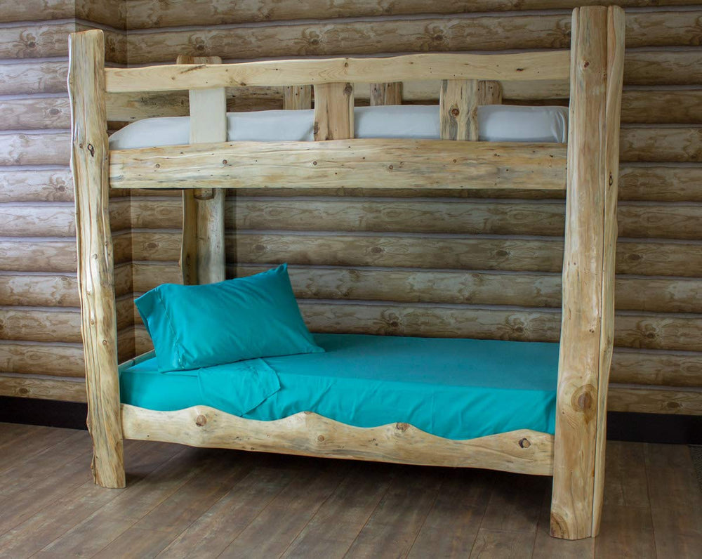 Everything Summer Camp cabin comfort cot sheet teal on bed showing snug cot fit