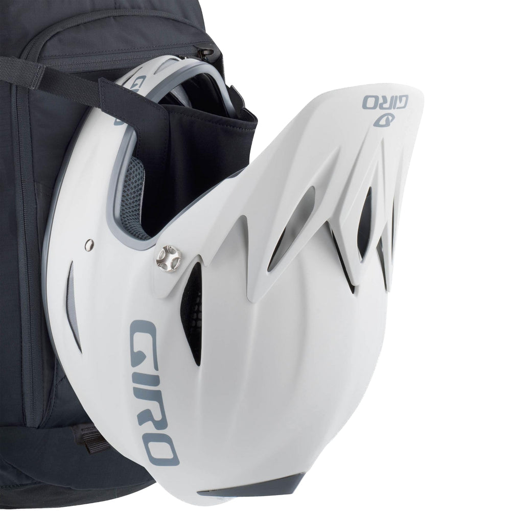 EVOC Enduro Blackline 16L side pocket open for versatile storage on rides