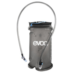 EVOC hydration bladder 2L cap close-up shows secure SLIDE SEAL for spill-free fills.
