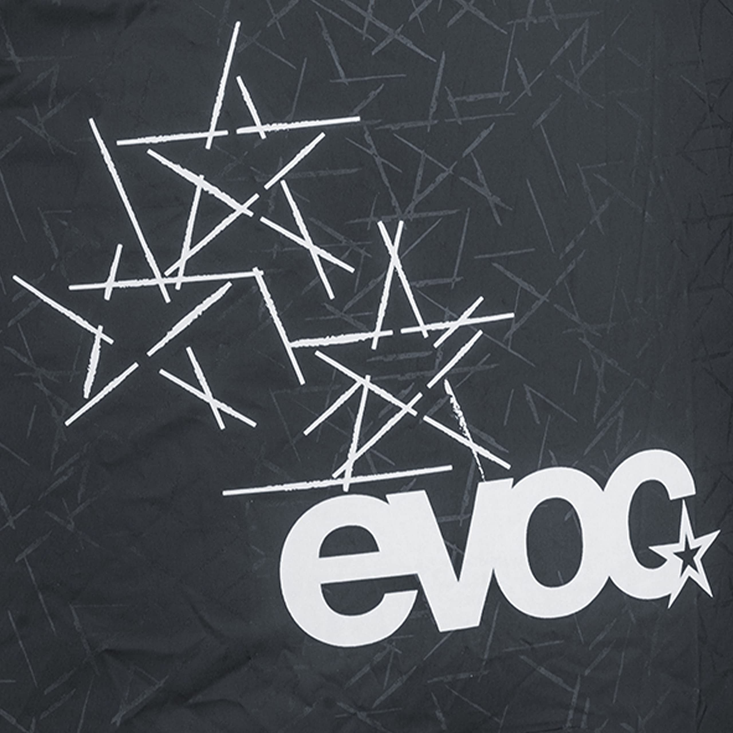 EVOC Raincover reflective print boosts visibility for safe night riding.