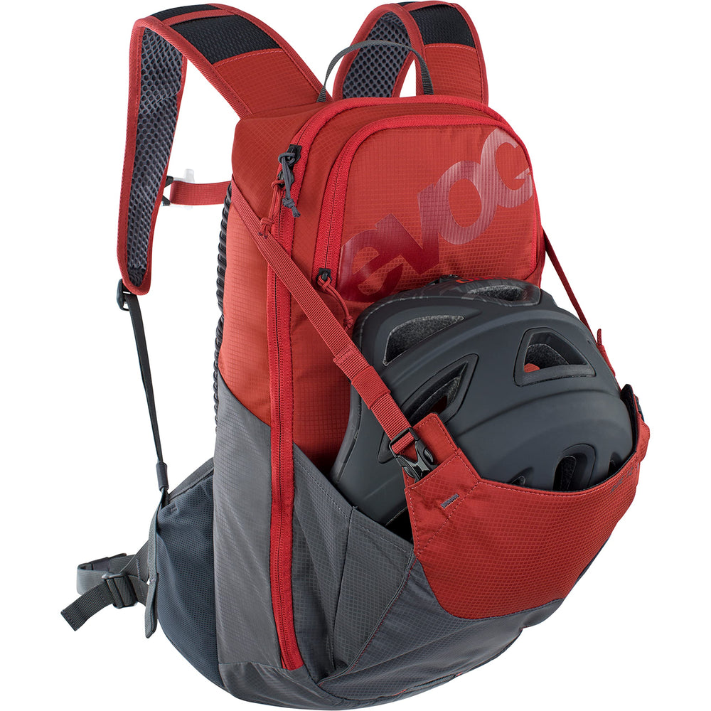 EVOC RIDE compact storage with multiple pockets keeps tools and essentials organized.