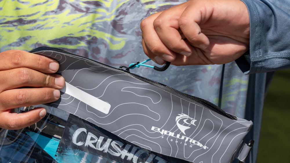 Evolution Fishing Bass Sack label panel and sturdy D-ring for organization.