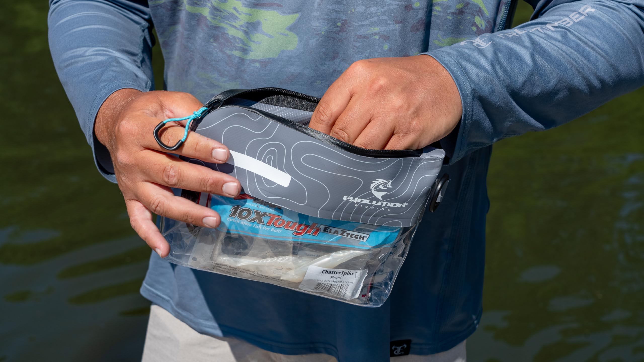 Evolution Fishing Bass Sack open with overextended zipper for easy loading.