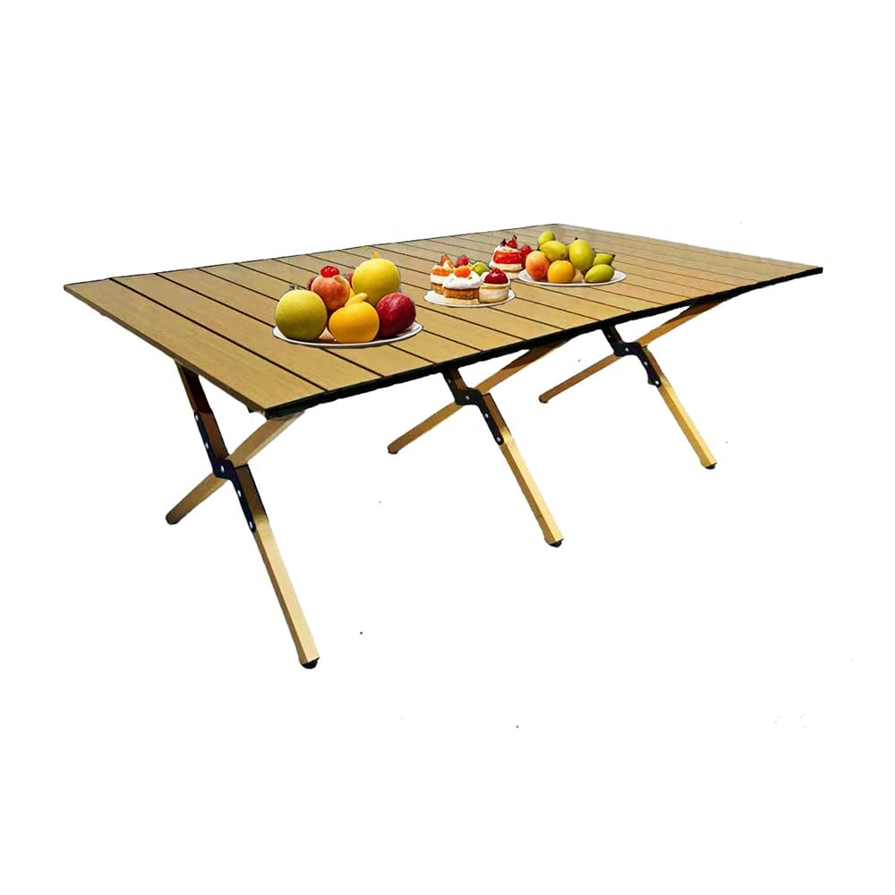 Evolve Heritage portable low aluminum roll-up table on beach setup for easy outdoor meals.