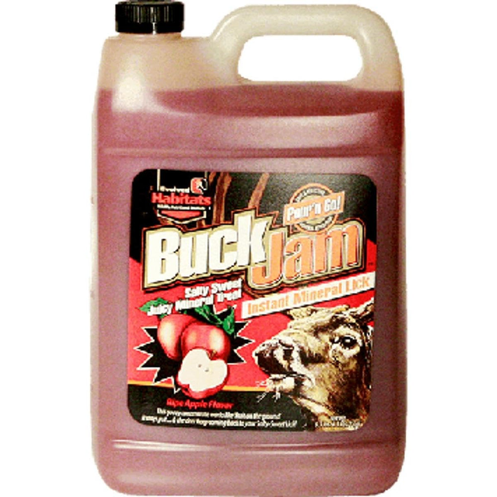 Evolved Habitats Buck Jam apple liquid mineral attractant being poured to attract deer