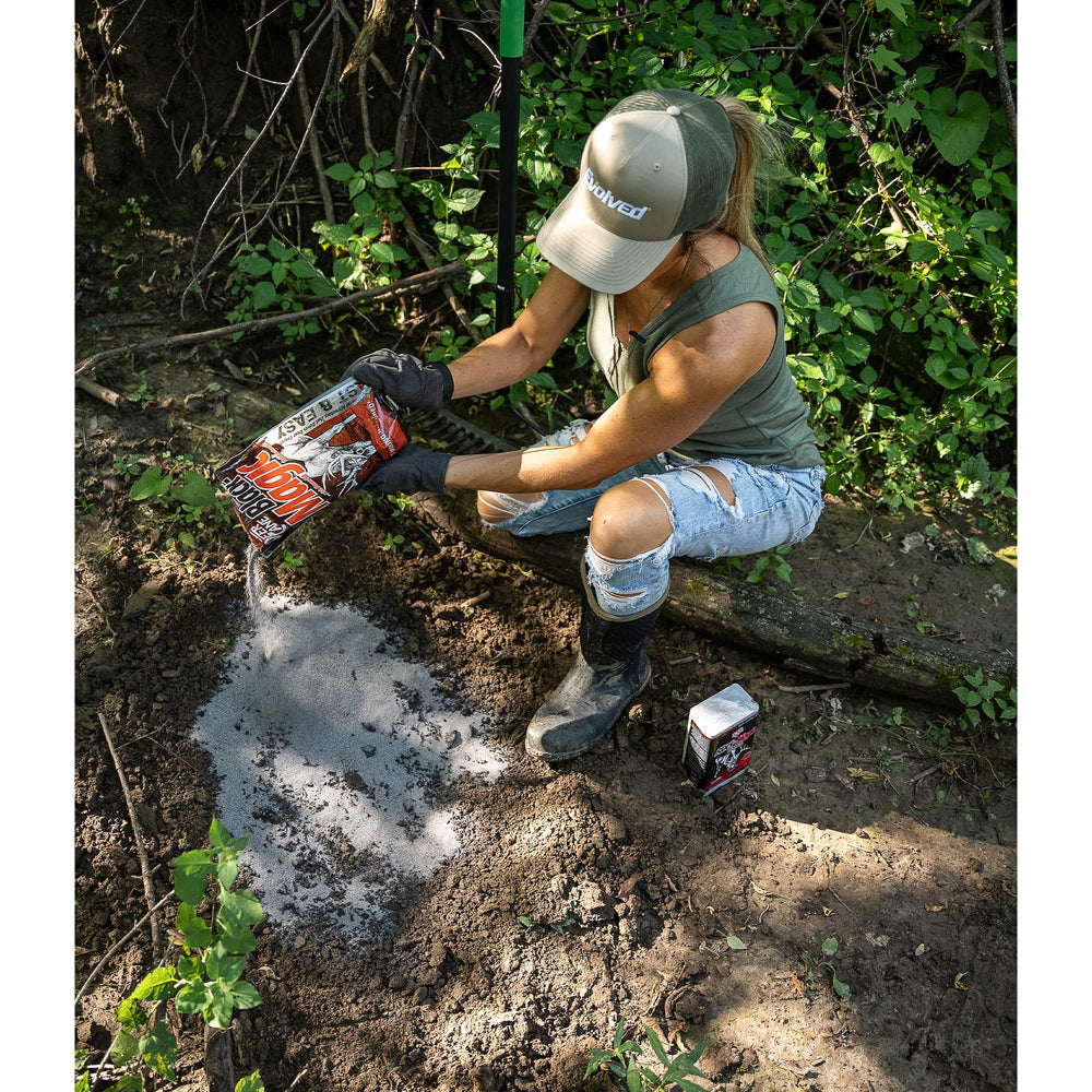 Debris cleared and soil loosened to prepare the site