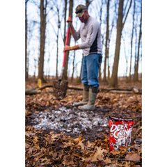 Powder-based mineral site established for deer attraction across seasons.