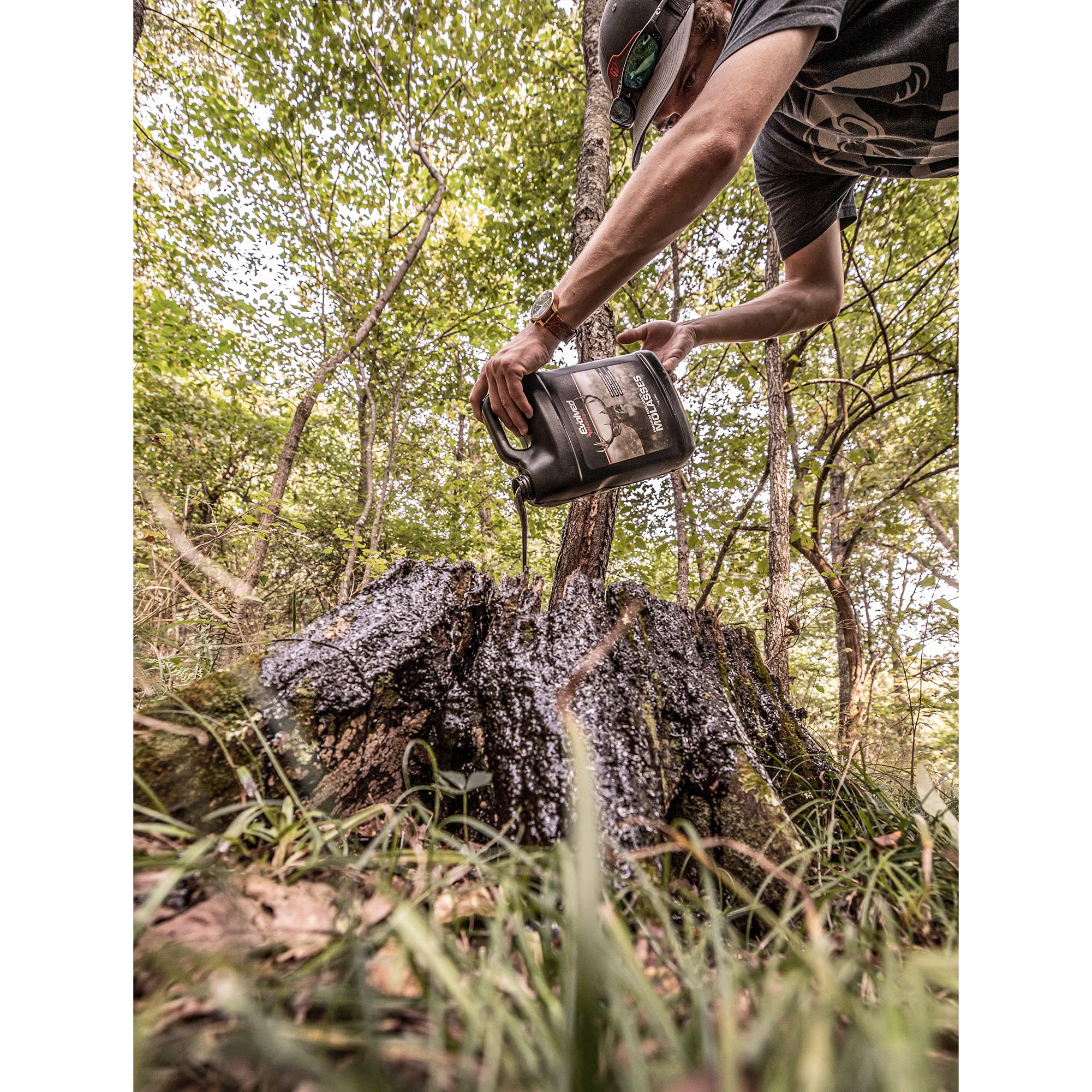 Evolved Habitats Premium Wildlife Molasses brown bottle and label signaling premium attractant