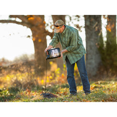Evolved Habitats Premium Wildlife Molasses serving top on grain demonstrates feeding option
