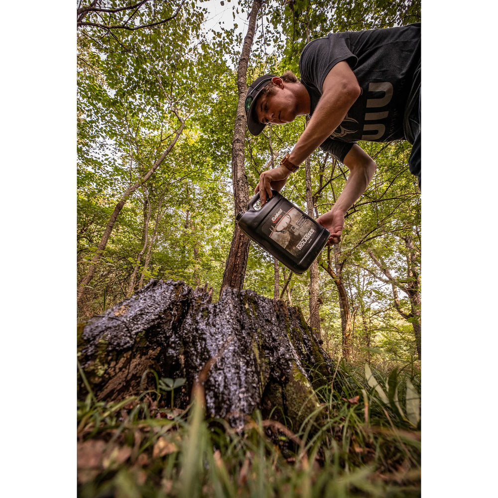 Evolved Habitats Premium Wildlife Molasses attracts wildlife in a field setting