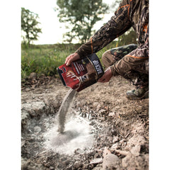 Rack-Up powder is spread on ground to attract deer immediately.