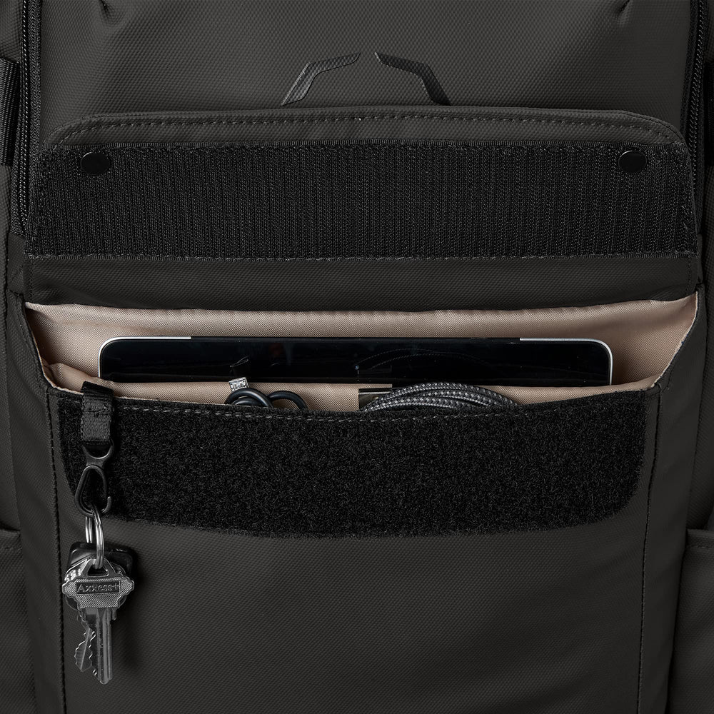 EvoShield Exec Backpack black rear luggage loop for travel compatibility.